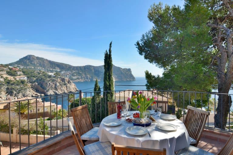 Outdoor Dining Area In Charming Villa With Enchanting Sea Views And Pool